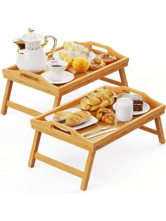 two wooden trays with food on them