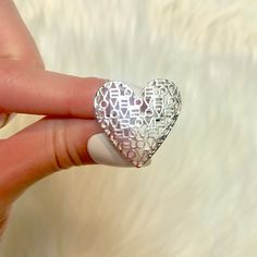 Silver “Love” Heart Ring! Metal: Silver Tone, Nickel Free. Size 6 New! Don’t Have A Poshmark Account Yet? Use Code: Crimsoncobbler At Sign Up To Receive $10! Pandora, Tiffany & Co, Harry Winston, Tacori, Cartier, Bvlgari, Tom Ford, Gucci, Dolce, Prada, Bergdorf Goodman, Neiman Marcus, Saks, Nordstrom Love Heart Ring, Tom Ford Gucci, At Sign, Harry Winston, Ring Metal, Bergdorf Goodman, Womens Jewelry Rings, Tiffany & Co., Tom Ford