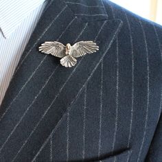 Eagle Lapel Pin Brooch Unique design by Handmade. Made by ✋🤚 with ❤️ at our studio.  This is wonderful gift for your loved ones.  It will show your jackets as chic and you will like to use with all your jackets and suits. Color: Silver and Gold Material: Plated Brass Elegant Business Lapel Pin Brooch, Elegant Silver Pins For Business, Elegant Silver Lapel Pin For Groom, Silver Brooch Lapel Pin For Groom, Pin Jacket, Men's Brooch, Collar Pin, Jacket Pins, Wedding Groomsmen