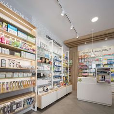 the inside of a pharmacy store with shelves full of products