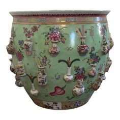 a large vase with many different designs on it