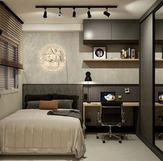 a bedroom with a bed, desk and shelves on the wall next to each other