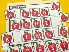 an apple themed alphabet flash card game for kids to practice letter recognition and matching letters