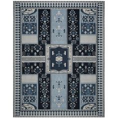 a blue and white rug with an intricate design on the bottom, in different colors