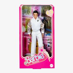 the barbie doll is in its pink box