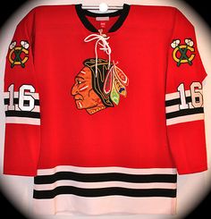 the chicago black hawks jersey is hanging up