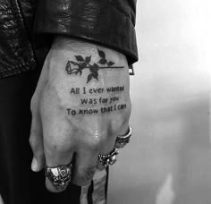 a person with a tattoo on their hand that says, all i ever wanted was for you to know what i am