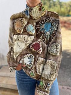 a woman wearing a jacket with many patches on it