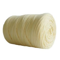 a roll of white yarn on a white background