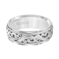 an engraved wedding band in white gold