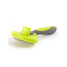 a green brush with a gray handle on a white background