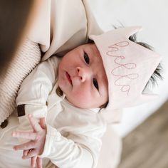 A pregnancy announcement, baby's first photo shoot or the perfect size for your little's favorite special stuffie, our baby crown is the sweetest accessory. Handcrafted from Oeko-Tex Certified Linen with a layer of batting for stability, these fabric crowns are available in a variety of colors. Madly Wish Linen Crowns are finished with a cotton twill tie. FEATURES Mini crown measures 7” wide with 8” ties Complimentary personalization available 100% pure European and Oeko-Tex Certified linen Made Fabric Crowns, Unique Pregnancy Announcement, Newborn Crown, Baby Boy Newborn Pictures, Fabric Crown, Baby Crown, Mini Crown, New Sibling, Sweet Accessories