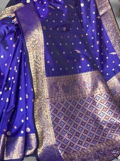 This beautiful blue saree and blouse combination is the epitome of traditional elegance mixed with contemporary design. Crafted with pure soft silk, this saree and blouse not only feel heavenly against the skin but also drape beautifully, ensuring that you exude grace and sophistication at all times.
What sets this saree apart is its exquisite copper and golden zari weaving border, along with a rich pallu adorned with captivating motifs. These intricate details truly make this piece a standout i Elegant Blue Pre-draped Saree For Puja, Blue Silk Pre-draped Saree For Traditional Ceremonies, Blue Wedding Pre-draped Saree With Zari Weaving, Blue Paithani Silk Pre-draped Saree With Traditional Drape, Blue Art Silk Pre-draped Saree With Traditional Patterns, Blue Pre-draped Saree With Zari Weaving, Blue Pre-draped Saree With Unstitched Blouse For Puja, Elegant Semi-stitched Royal Blue Saree, Elegant Royal Blue Semi-stitched Saree