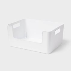 a white plastic storage container with handles