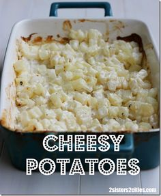 a casserole dish with cheese potatoes in it and the words cheesy potatoes