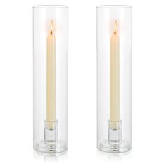 two clear glass vases with a lit candle inside one and another in the other