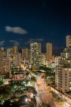 the city is lit up at night time