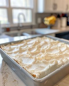 a pan filled with cake sitting on top of a counter