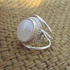 Handmade item Ships from a small business in India Materials: Silver, Stone Sustainable features: gemstones. Items may include additional materials or use methods that aren't considered sustainable features on our site. Learn more Gemstone: white moon stone Style: Boho & hippie Natural Moonstone ring , Blue flashy  gemstone ring , Sterling silver moon stone ring , Bridesmaid gift , Gift for Women ♥️ We accept customization contact us For Custom orders. ♥️ Product Detail :-- ♥️ Metal :- 925 Sterling Silver ♥️ Gemstone : natural moon stone  ♥️ Main stone creation :- Natural ♥️ Metal Purity : 925 parts per 1000 FEEDBACK :- Please contact us if you have any problem with the product before leaving negative feedback, opening a case or a return request. we will try our very best to solve any prob White Moon, 925 Ring, Ring Blue, Silver Moon, Oval Stone, Moonstone Ring, Hippie Bohemian, Moon Stone, 925 Silver Rings