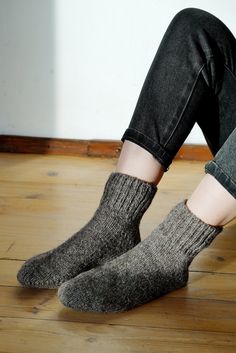 These natural wool socks are handmade following Scandinavian design. They will warm you or your beloved ones during the coldest winter months. Warm woolen socks are also a great gift idea. The socks are made from cruelty-free sheep and dog wool. Dogs are combed, and their hair is mixed with sheep wool to get the perfect combination. Researchers have found that man benefits from dog wool, which has healing properties. It relieves a wide range of pain, especially radiculitis. Knits made of dog woo Cozy Wool Socks For Winter, Cozy Brown Socks For Stocking Stuffers, Warm Thick Socks For Stocking Stuffers, Cozy Warm Brown Socks, Handmade Cozy Socks For Fall, Brown Winter Outdoor Socks, Warm Cozy Socks, Winter Outdoor Brown Socks, Cozy Warm Socks