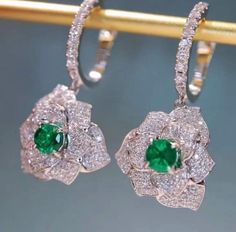 18ct White Gold Stunning Vivid Green Emerald and Diamond Cocktail Earrings VS Stamped 750/18k white solid gold Featuring top quality vivid green emeralds 1,80 carats total weight VS, genuine white diamonds 1,60 carats VS2/G Handmade in Italy Cocktail Earrings, White Solid, Green Emerald, White Diamonds, Flower Earrings, Diamond White, Emerald Green, Favorite Jewelry, Jewelry Earrings Dangle