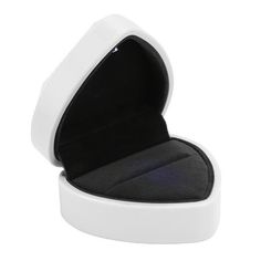 an open white ring box on a white background with the lid opened to show it's inside