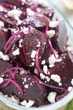 a bowl filled with beets and feta cheese