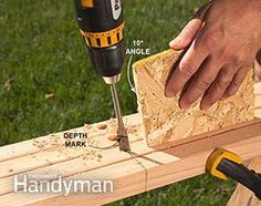 a person using a drill to cut wood