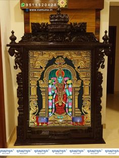 an intricately decorated wooden statue in the middle of a room