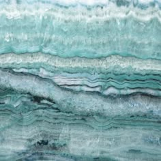 an abstract painting with blue and white waves on the ocean shore, as if it were painted in acrylic paint