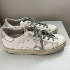 Golden Goose High Star With Star And Heel Tab In Metallic Silver. High Star Golden Goose, Shoes Golden Goose, Goose Shoes, Golden Goose Shoes, Golden Goose, Womens Shoes Sneakers, Silver Color, Metallic Silver, Shoes Sneakers