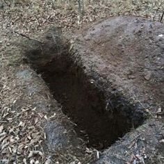 an open hole in the ground that has been dug