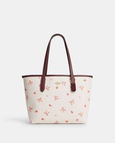 COACH® | Mini City Tote With Bow Tie Print Spring Coach Leather Shoulder Bag, Casual Coach Bags In Coated Canvas, Casual White Coated Canvas Shoulder Bag, City Tote Bag, Mini City, Bow Bag, Girly Bags, Coach Tote, Luxury Purses