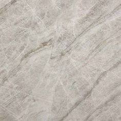 a white marble textured surface with grey veiners