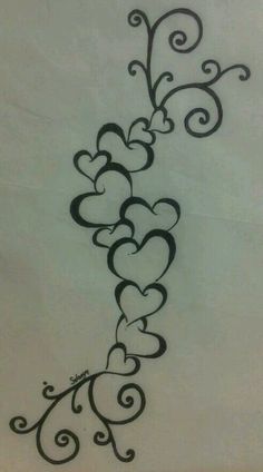 a tattoo design with hearts on it