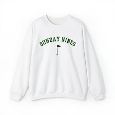 There's nothing better than 9 holes on Sunday! Sport this pullover for your next weekend round. White and green design. Ideal for any situation, a unisex heavy blend crewneck sweatshirt is pure comfort. These garments are made from polyester and cotton. This combination helps designs come out looking fresh and beautiful. The collar is ribbed knit, so it retains its shape even after washing. There are no itchy side seams on these sweaters.  .: 50% cotton, 50% polyester .: Medium-heavy fabric (8.0 oz/yd² (271.25 g/m .: Loose fit .: Sewn-in label .: Runs true to size Golf Swag, Trendy Golf, Golf Sweatshirt, Golf Sweater, Golf Sweaters, Golf Attire