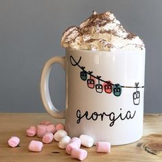 a mug filled with hot chocolate and marshmallows