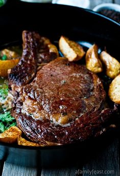 steak and potatoes in a cast iron skillet