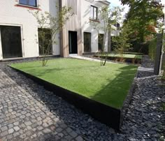 a house that has grass in front of it