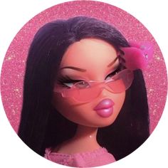 a close up of a barbie doll wearing glasses and a pink bow on her head