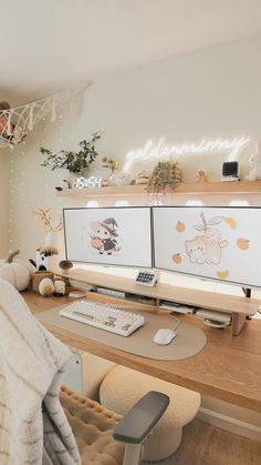 a computer desk with two monitors sitting on top of it