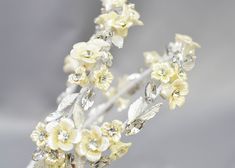 a tiara with flowers and crystals on it