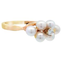 This stunning 14k yellow gold ring is made by the world renowned Tiffany & Co. and features pearl with a diamond centerstone. This unique combination of materials is the perfect blend of natural wonders and elegance. Fun and durable enough to be worn on a daily basis, out and about, while still being sophisticated enough to wear to any formal event. Tiffany & Co. 14k Yellow Gold Diamond and Pearl Ring  Ring size: 4.5 14k yellow gold 1 = .02 carat, round cut, VS2 clarity, F/G color diamond 6 = Ak Diamond And Pearl Ring, Pearl And Diamond Ring, Tiffany And Co, Akoya Pearls, Yellow Gold Ring, Vintage Antique Jewelry, Jewelry Rings Engagement, Pearl Ring, Ring Ring