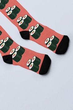 Dive into a sea of adorable sushi rolls with our Negitoro Maki Sushi Socks! Get ready to roll with laughter as our charming negitoro maki sushi rolls, in vibrant red, white, black, and green, pop against a striking red background. Carefully crafted for both style and comfort, our Negitoro Maki Sushi Socks are perfect for those who crave fun, quirky designs and a cozy fit. Made from high-quality materials, including 95% polyester and 5% spandex, these socks offer a soft, stretchy feel that lasts Maki Rolls, Sushi Socks, Maki Sushi, Sushi Design, Red Backdrop, Sock Drawer, Good Times Roll, Funny Socks, Sushi Rolls