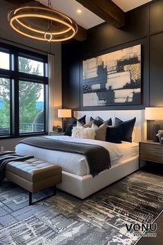 a modern bedroom with black and white decor