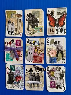 six playing cards with pictures of people and butterflies