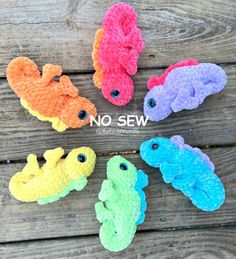 six different colored crocheted alligators are shown on a wooden surface with the words no sew written above them