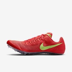 the nike air zoom low is bright red and neon green, with an upper - cut outs