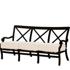 a black and white bench with cushions on it