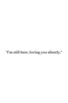 a white wall with the words i'm still here loving you silently